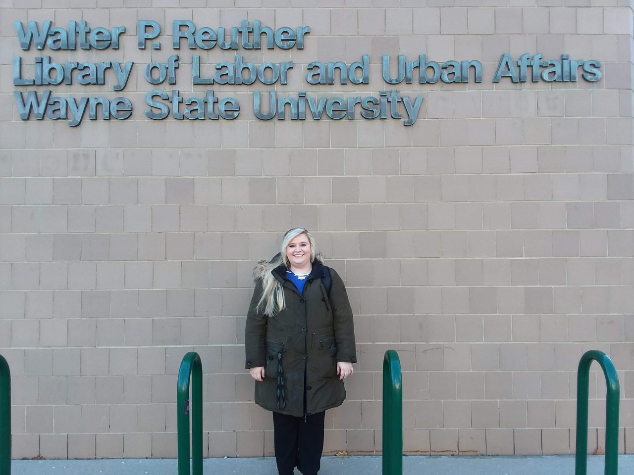 SIS student Ashley Cabala is pictured in front of Wayne state's Reuther Library.